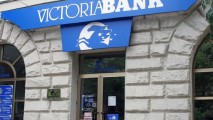 Суд обязал Victoriabank выплатить миллион леев семье убитого в 2014 году инкассатора